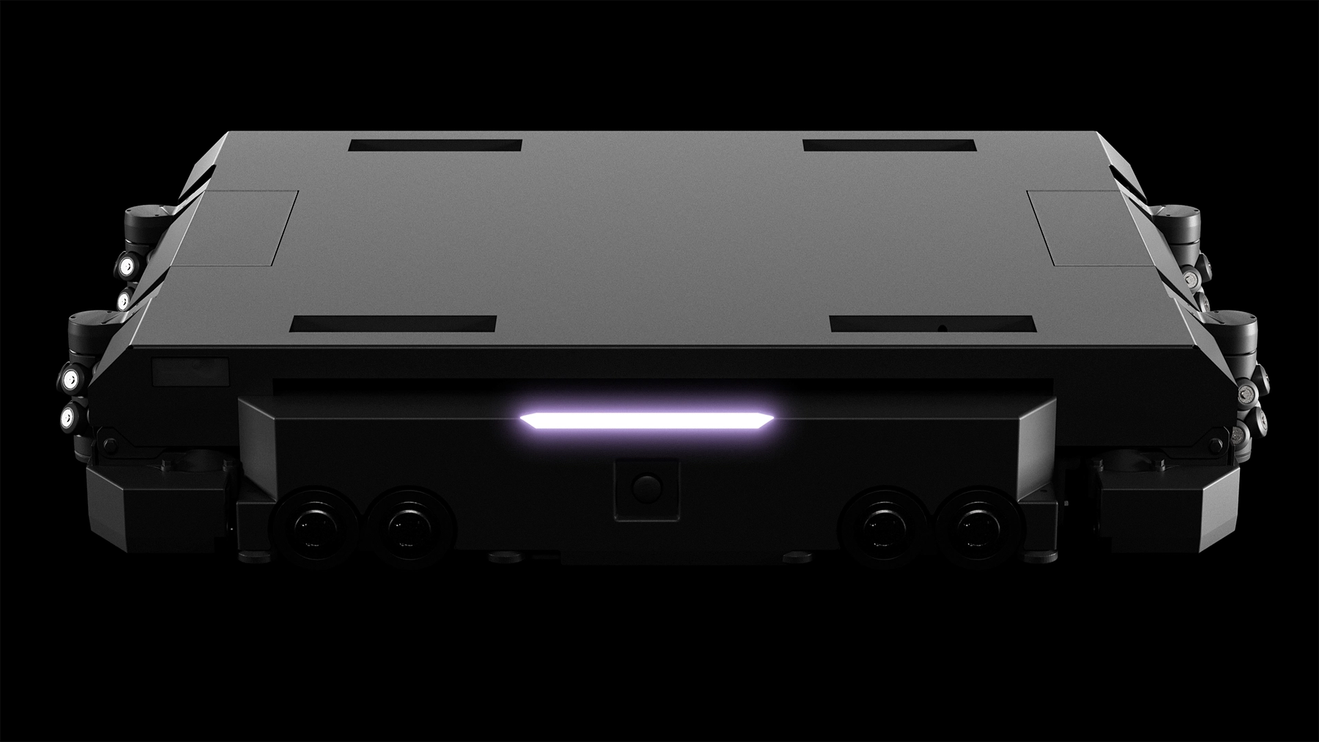 Front view of a rugged black device with a glowing white LED light strip and gray top panel against a dark background
