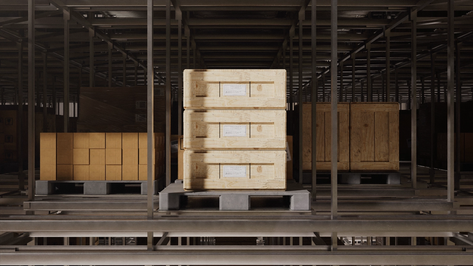 Three large wooden crates stacked on pallets inside an industrial warehouse with metal framework and columns