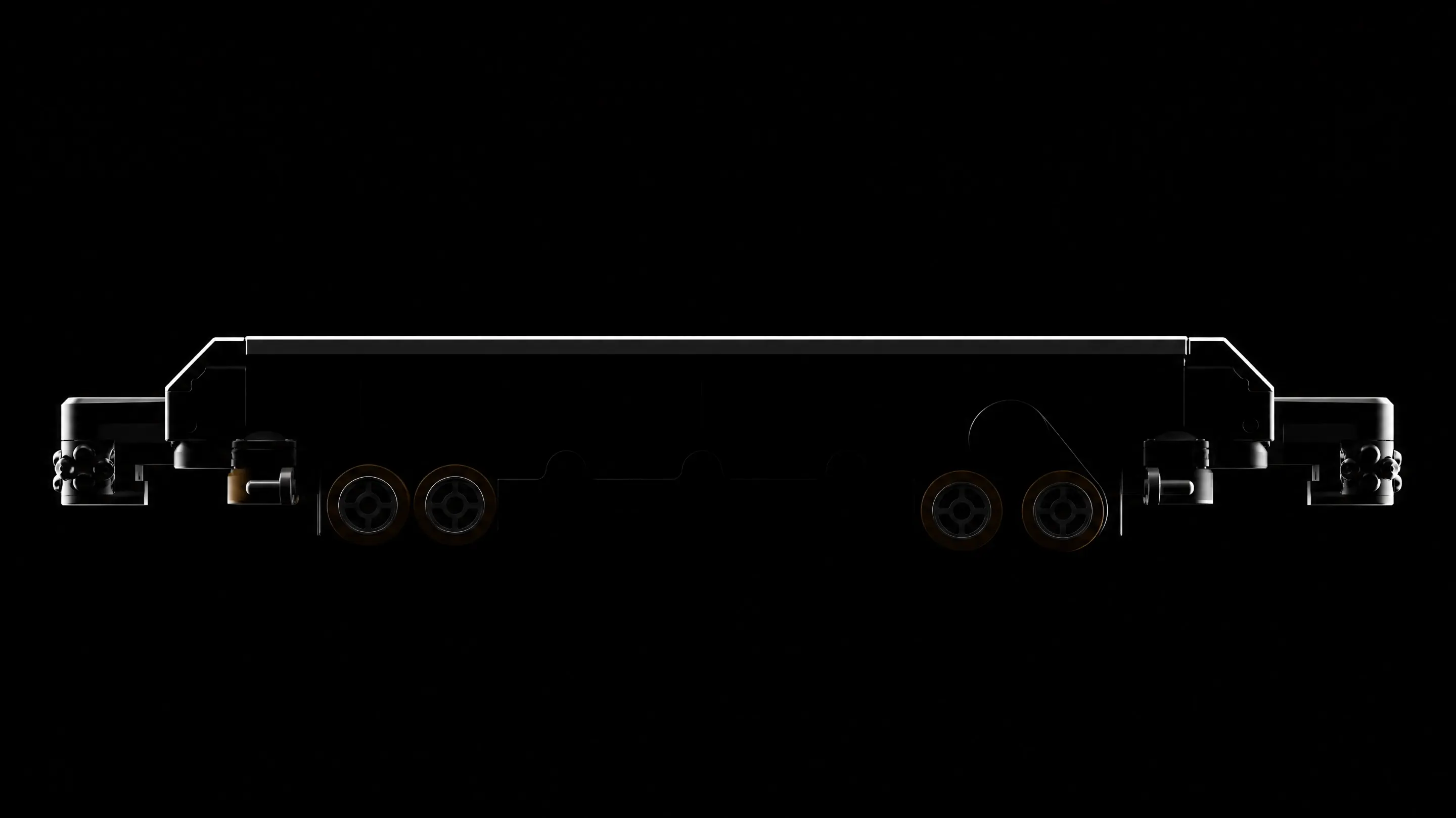 Black silhouette of truck front-end view showing cab and axle details on white background.