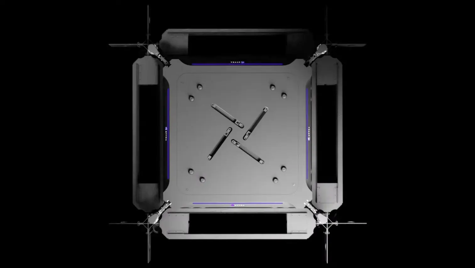 Top-down view of drone with four propellers on black background