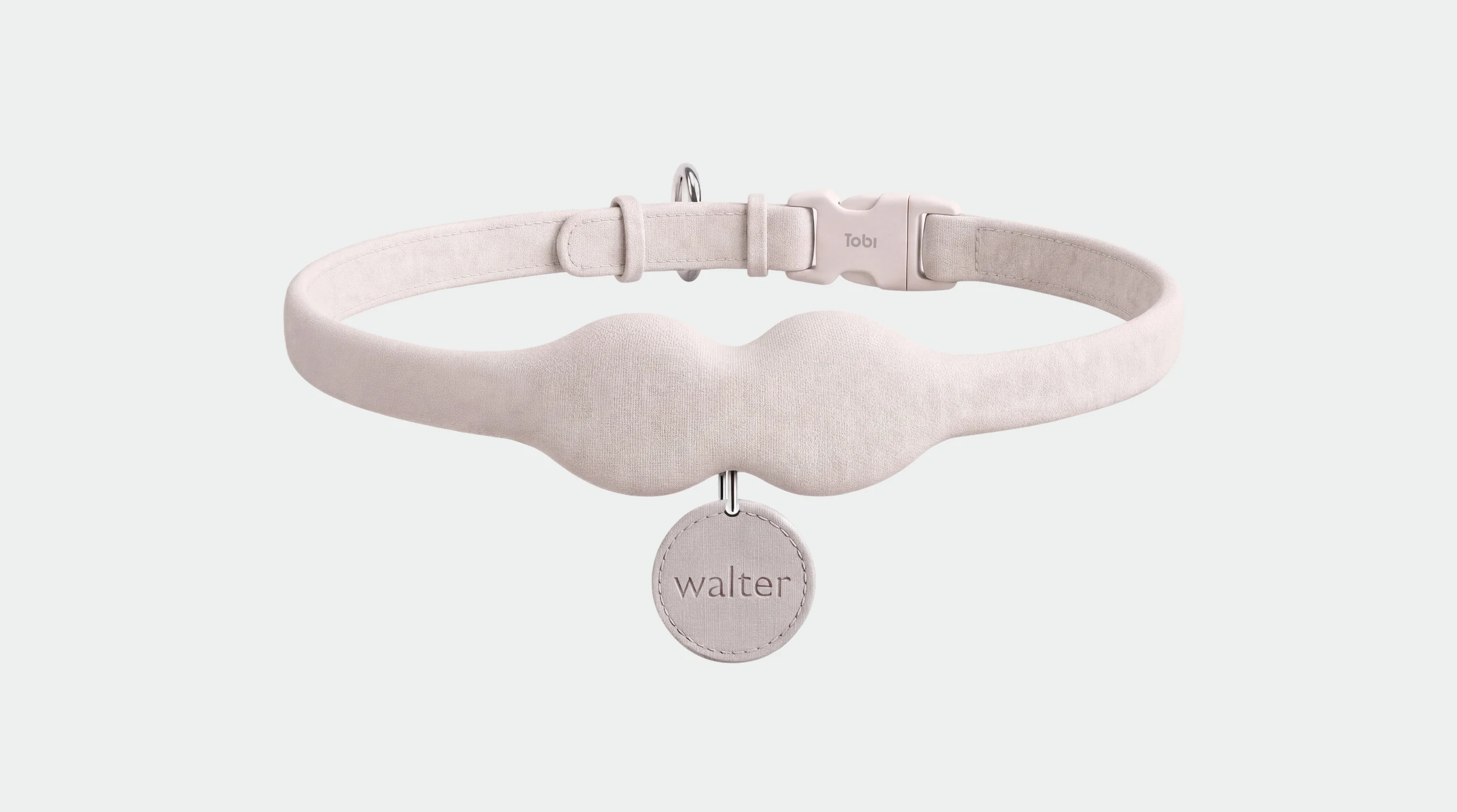 The Tobi collar in blush, with a name tag reading walter