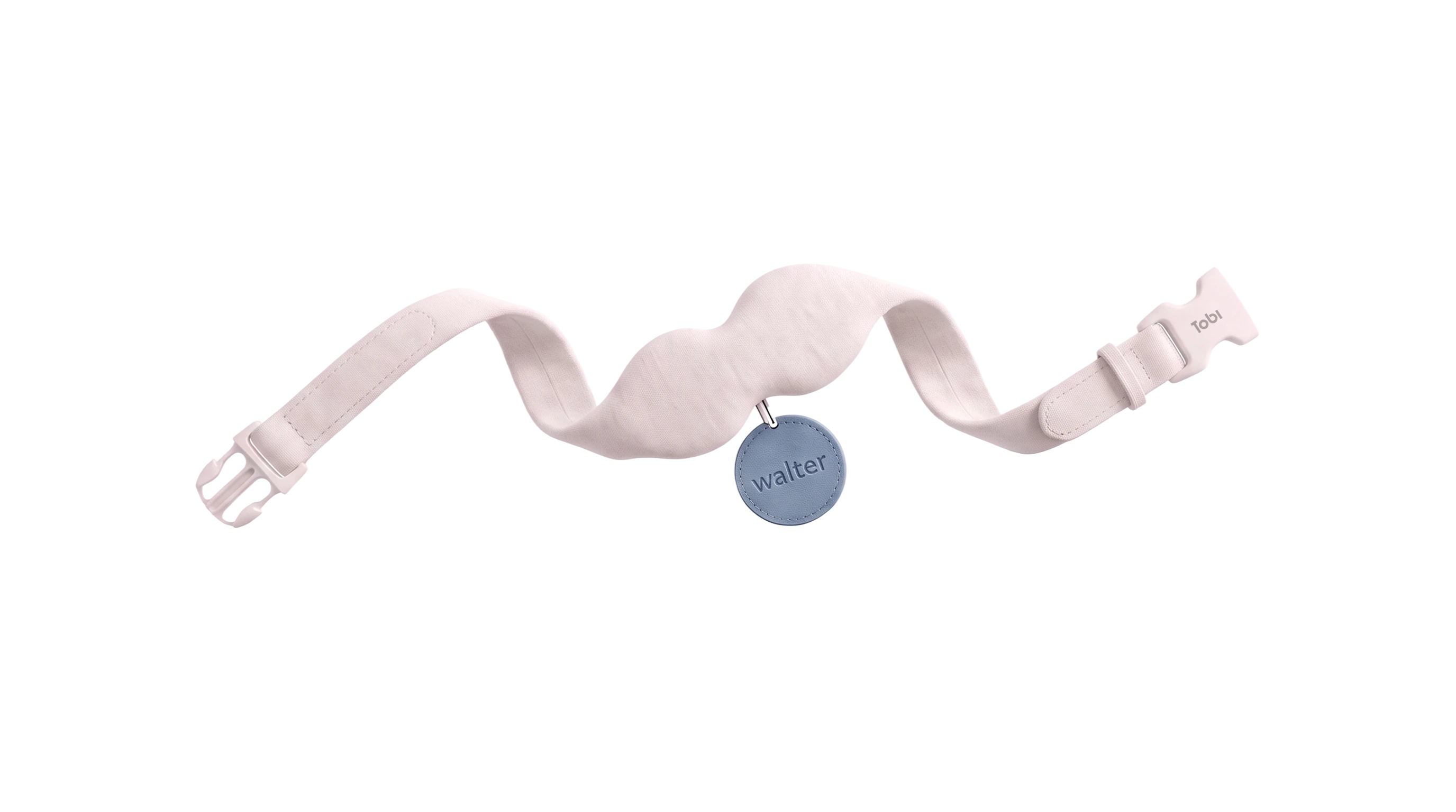 The Tobi collar, bent into an S, with its tag