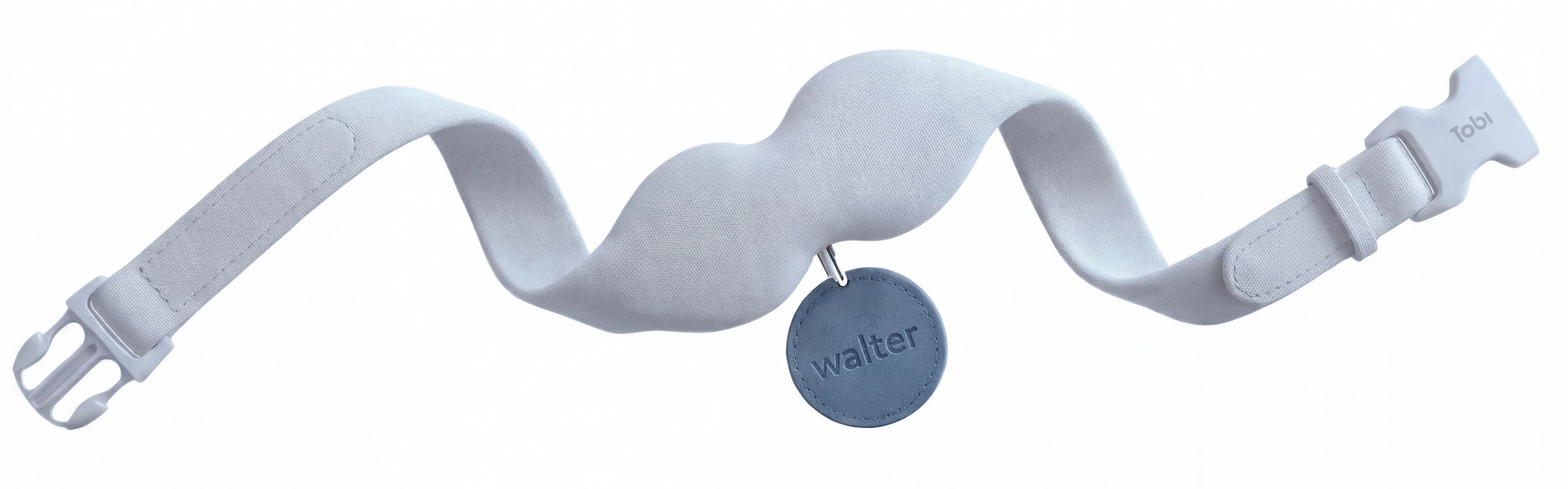 The Tobi collar laid out in an S-bend, its tag hanging from the middle